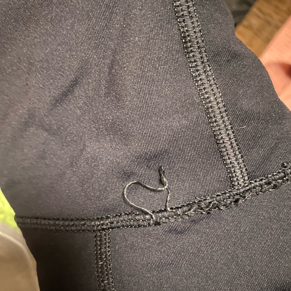 Black Aerie leggings with see through pattern on both sides of the legs - Picture 6 of 6